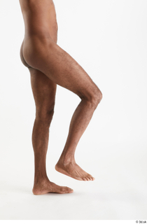 Tiago  1 flexing leg nude side view 0003.jpg